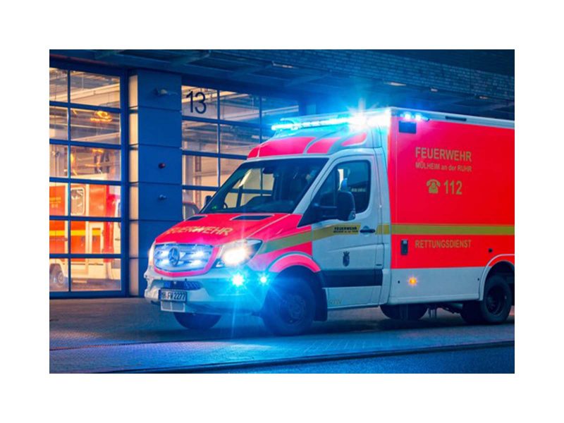 Intersection Light In Situ Blue Lit on Fire Vehicle