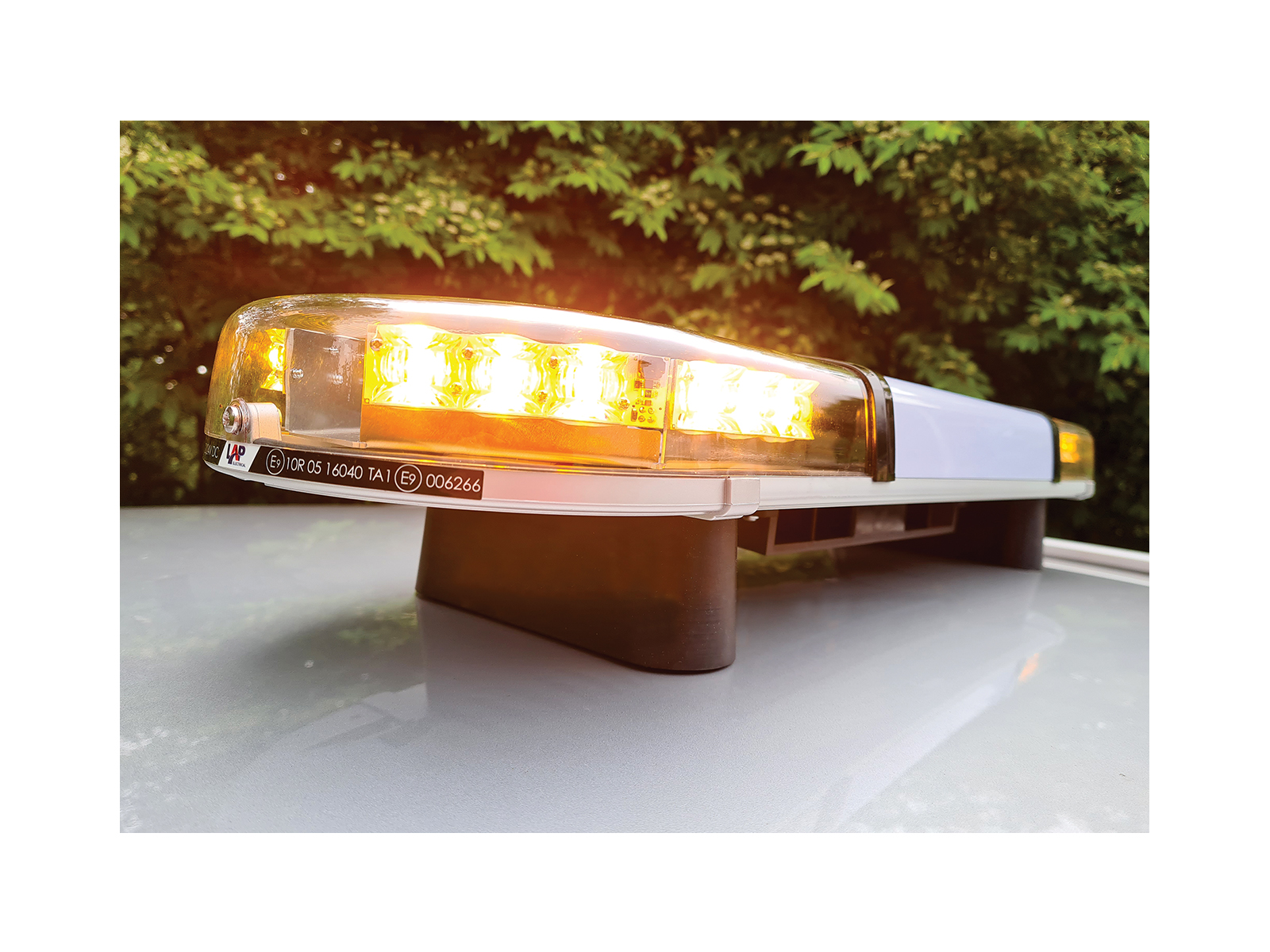 Hurricane PA Lightbar with 60 Watt Speaker Driver In Situ Angle View Lit No Livery Close Up on Roof of Silver Car