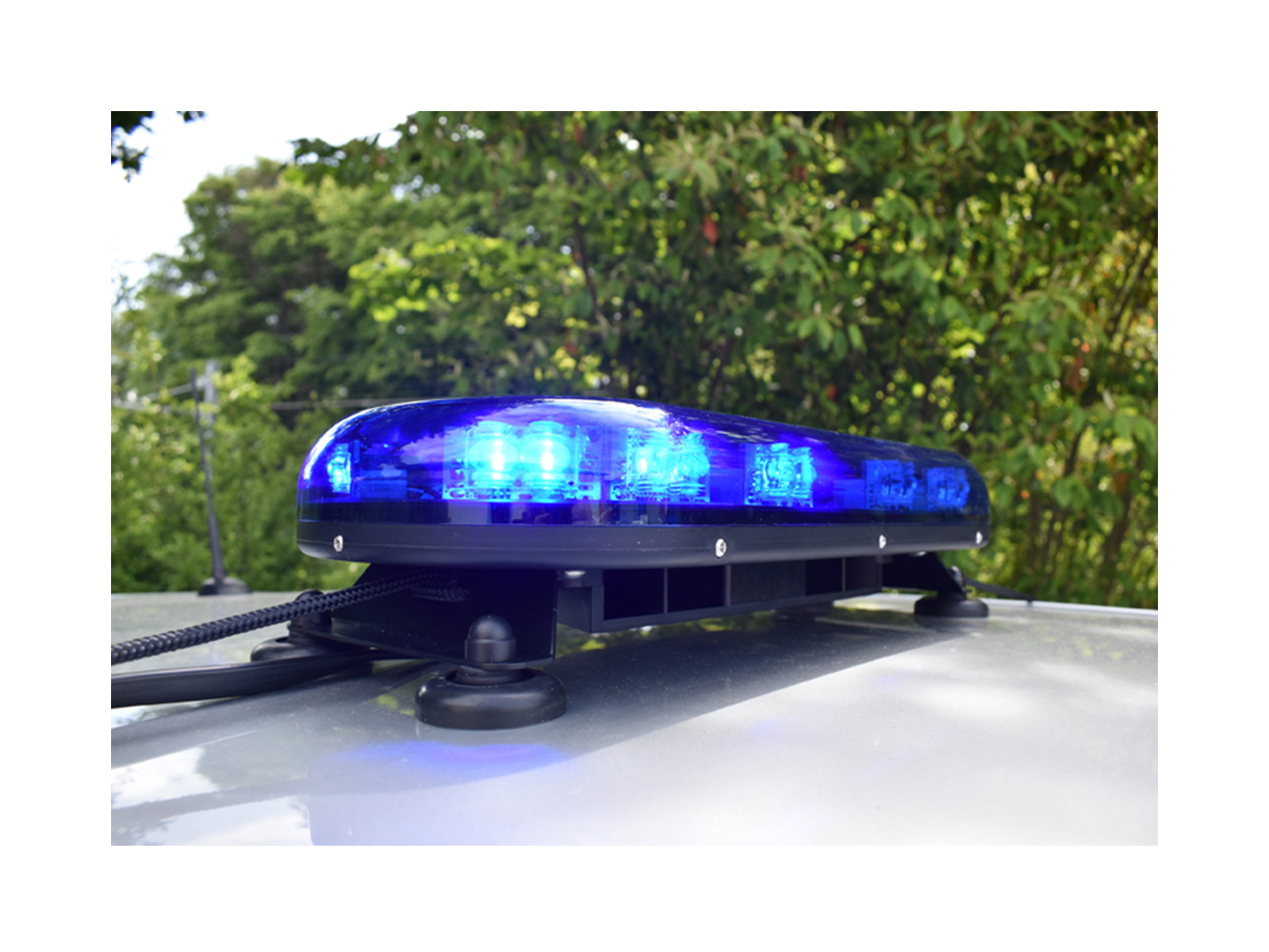 Trail Blazer 2 LED Mini Lightbar Blue Angle View In Situ on Silver Car Roof 2