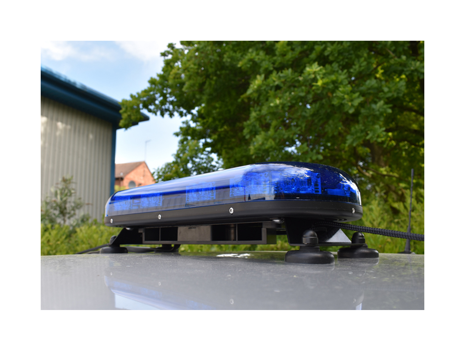 Trail Blazer 2 LED Mini Lightbar Blue Angle View Unlit In Situ on Silver Car Roof